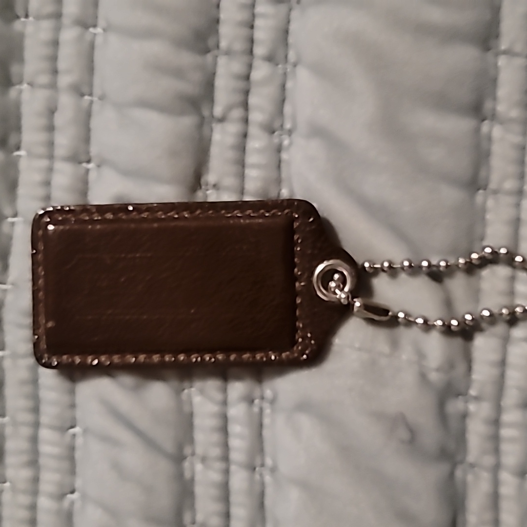 Coach Hang Tag
